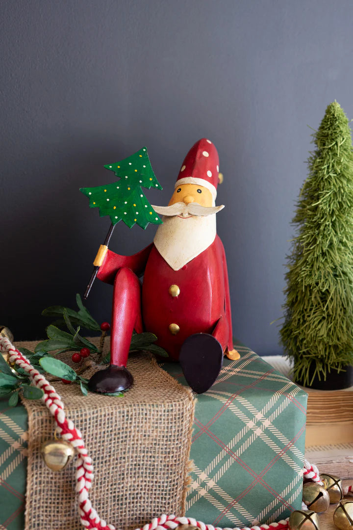 Painted Iron Santa sitting w/Tree