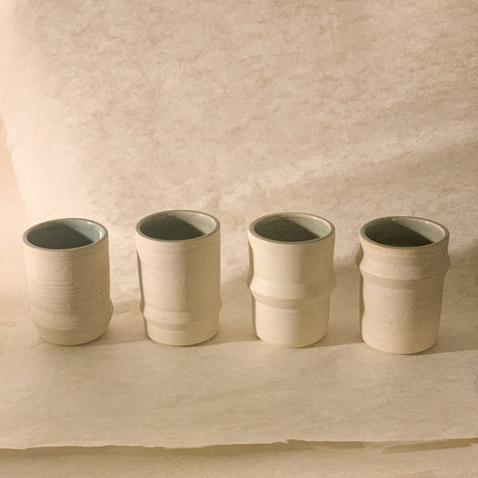 Olivia Snow Ceramics - Saturn Ceramic Tumblers in White and Celadon