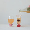 Creative Co-Op Blown Fluted Drinking Glass w/Ball Stem in Pink